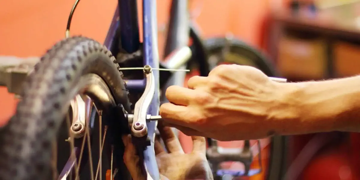Pilgrim fixing his bike