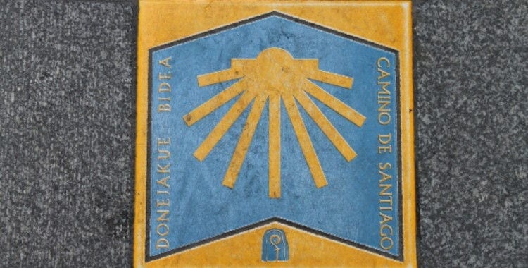A sign of the Camino de Santiago in the floor