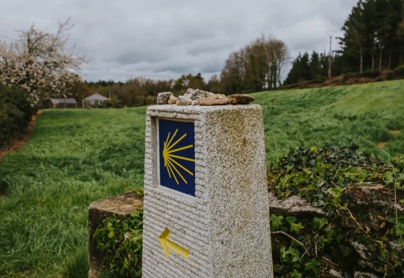 A cairn of the last 100 km of the Camino