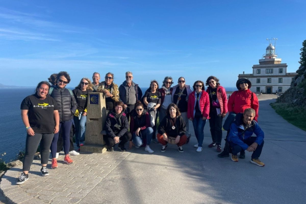 Pilgrims at Km. 0 of the Camino de Finisterre